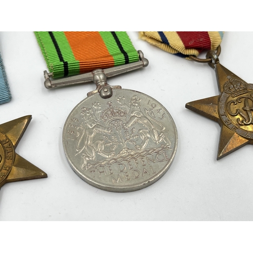 2294 - Five WWII medals, The Defence, The 1939-1945 Star, The France and Germany Star, The Italy Star and T... 