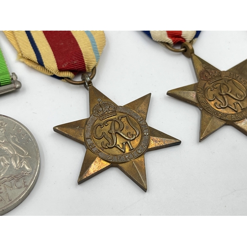 2294 - Five WWII medals, The Defence, The 1939-1945 Star, The France and Germany Star, The Italy Star and T... 