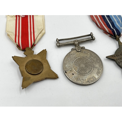 2295 - Five military and police medals to include Africa Service medal, India Police Independence, Belgian ... 