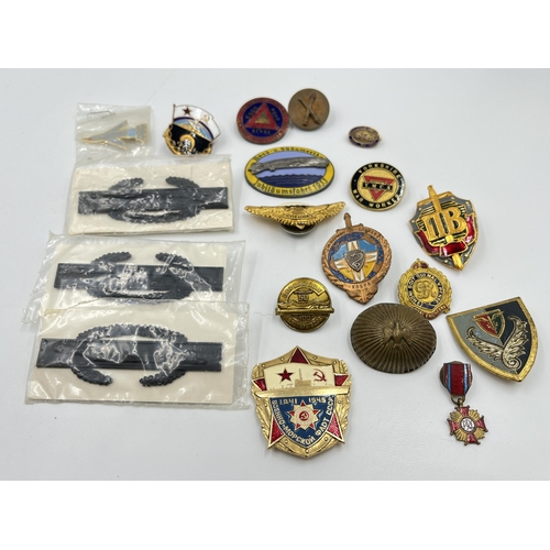 2296 - A collection of badges to include Macclesfield and District Joint Road Safety Committee, Russian, Y.... 