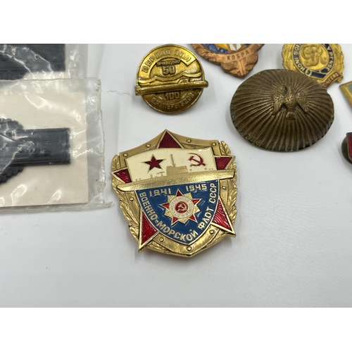 2296 - A collection of badges to include Macclesfield and District Joint Road Safety Committee, Russian, Y.... 