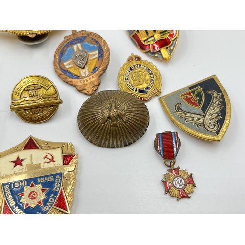 2296 - A collection of badges to include Macclesfield and District Joint Road Safety Committee, Russian, Y.... 