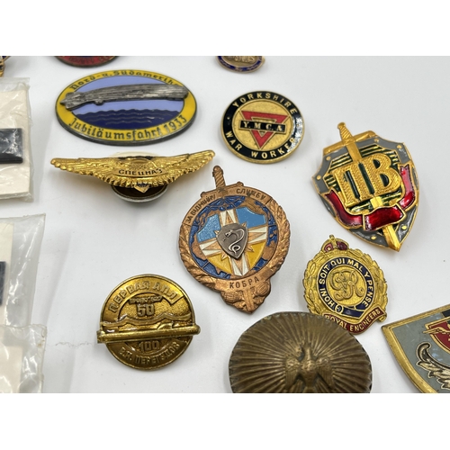 2296 - A collection of badges to include Macclesfield and District Joint Road Safety Committee, Russian, Y.... 