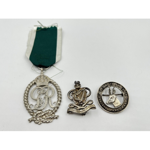 2297 - Three military items, two hallmarked sterling silver cap badges and one Royal Naval Volunteer reserv... 