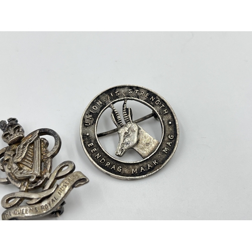 2297 - Three military items, two hallmarked sterling silver cap badges and one Royal Naval Volunteer reserv... 