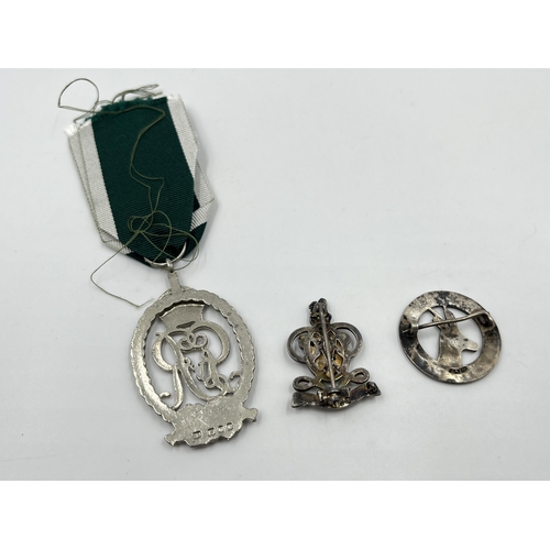 2297 - Three military items, two hallmarked sterling silver cap badges and one Royal Naval Volunteer reserv... 