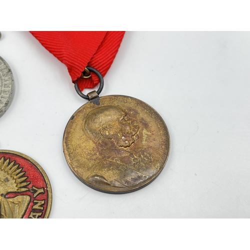 2299 - Four medals to include 1898 Jubilee medal commemorating Franz Joseph I, 1902 Edward VII and Queen Al... 