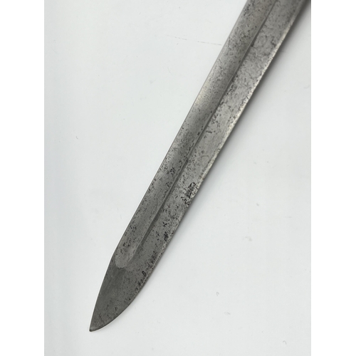 2312 - An original WWI German butcher's bayonet made by V.C. Schilling - approx. 50cm long including handle