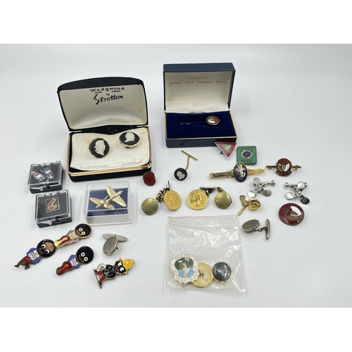 2331 - A collection of badges and cufflinks to include Wedgwood black Jasperware by Stratton Julius Caesar ... 