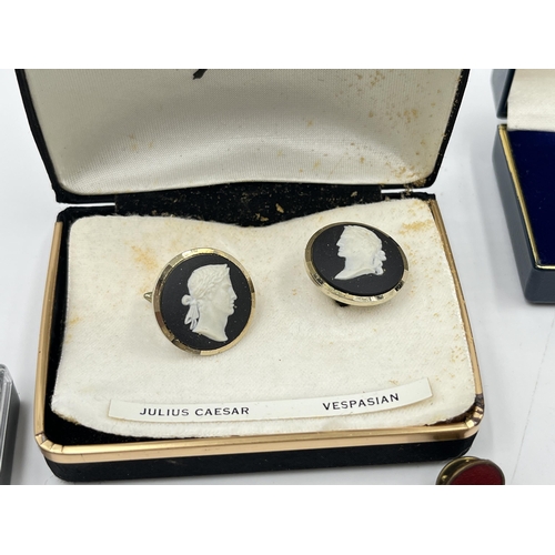 2331 - A collection of badges and cufflinks to include Wedgwood black Jasperware by Stratton Julius Caesar ... 