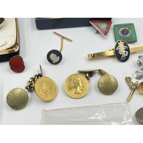 2331 - A collection of badges and cufflinks to include Wedgwood black Jasperware by Stratton Julius Caesar ... 