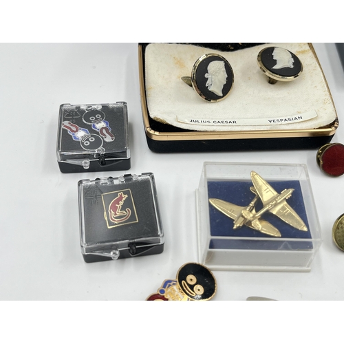 2331 - A collection of badges and cufflinks to include Wedgwood black Jasperware by Stratton Julius Caesar ... 