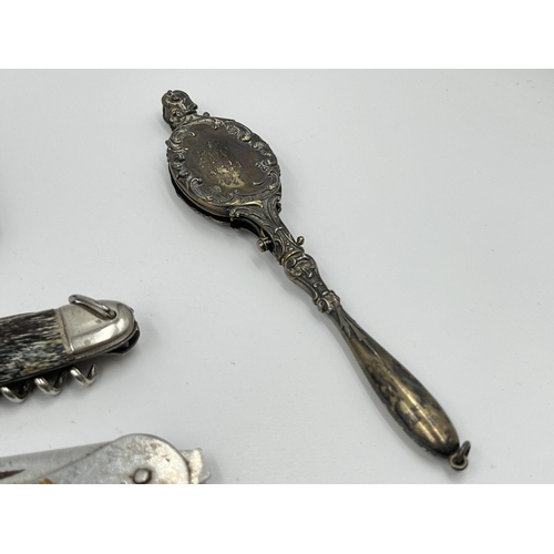 2332 - A collection of items to include .800 silver mustard spoon, Victorian hallmarked London silver condi... 