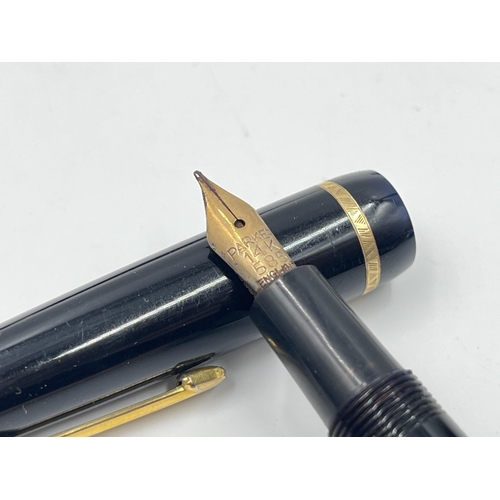 2336 - A collection of writing instruments to include Parker Duofold fountain pen with 14ct gold nib, Conwa... 