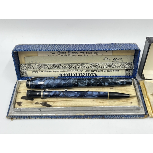 2336 - A collection of writing instruments to include Parker Duofold fountain pen with 14ct gold nib, Conwa... 