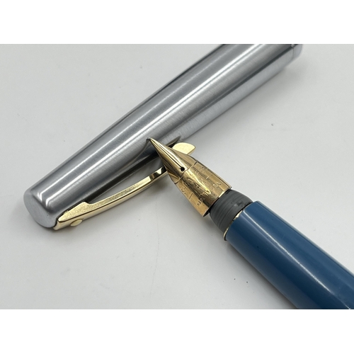 2336 - A collection of writing instruments to include Parker Duofold fountain pen with 14ct gold nib, Conwa... 