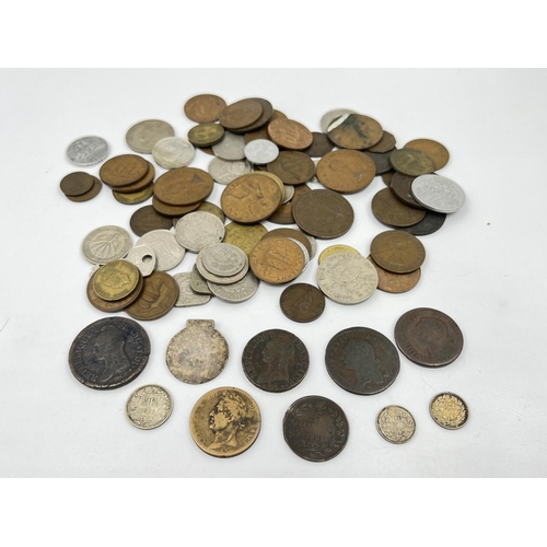 2343 - A collection of coins to include 83.5% silver 1963 Switzerland ½ franc, 64% silver 1935 and 1939 Net... 