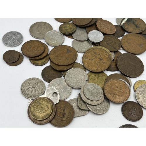 2343 - A collection of coins to include 83.5% silver 1963 Switzerland ½ franc, 64% silver 1935 and 1939 Net... 