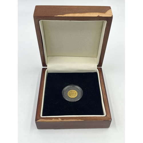 2345 - A boxed 2009 Tristan Da Cunha Charles Darwin 1/25th of an ounce .999 gold 1 crown coin with certific... 