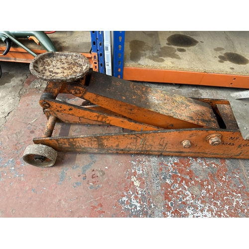 887 - Two items, one large two ton hydraulic trolley jack and one pair of bottle jacks