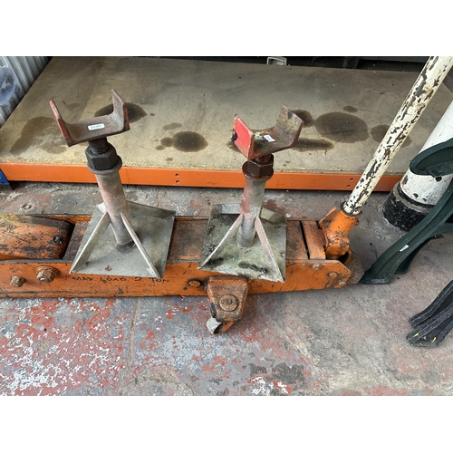 887 - Two items, one large two ton hydraulic trolley jack and one pair of bottle jacks