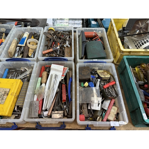 911 - Ten boxes containing a large collection of tools to include taps and dies, drill bits, chucks, boxed... 