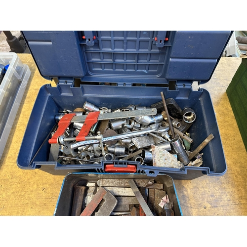 912B - Two boxes and two tool boxes containing a collection of tools and lathe cutters to include Sandvik C... 