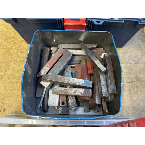 912B - Two boxes and two tool boxes containing a collection of tools and lathe cutters to include Sandvik C... 