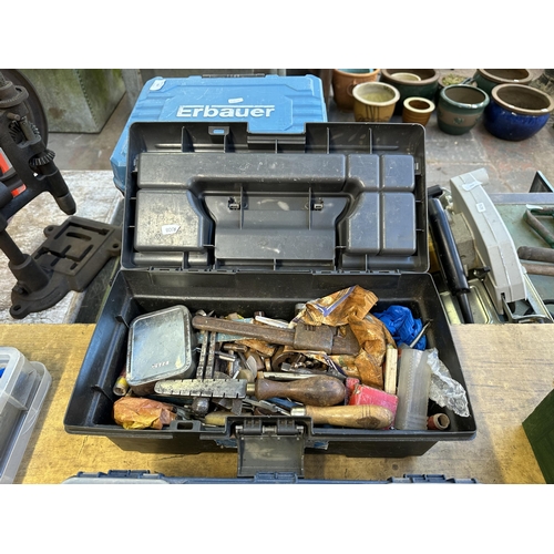 912B - Two boxes and two tool boxes containing a collection of tools and lathe cutters to include Sandvik C... 