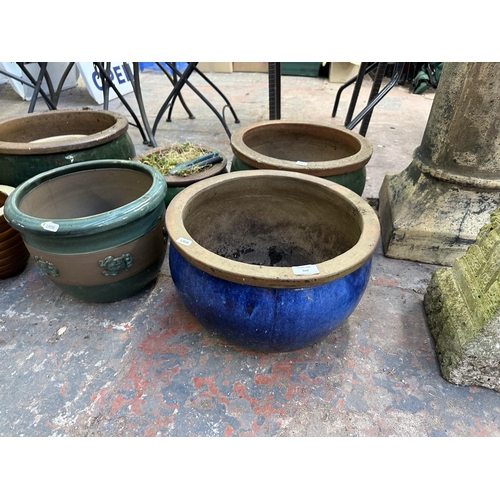 948 - Ten terracotta and glazed planters