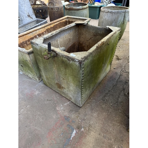 951 - A galvanised and riveted water tank - approx. 52cm high x 68cm long x 51cm deep