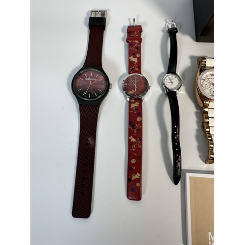 2172 - Five quartz fashion wristwatches to include Superdry, boxed Michael Kors, Emporio Armani etc.