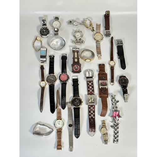 2181 - A large collection of quartz wristwatches to include Michael Kors, Geneva etc.