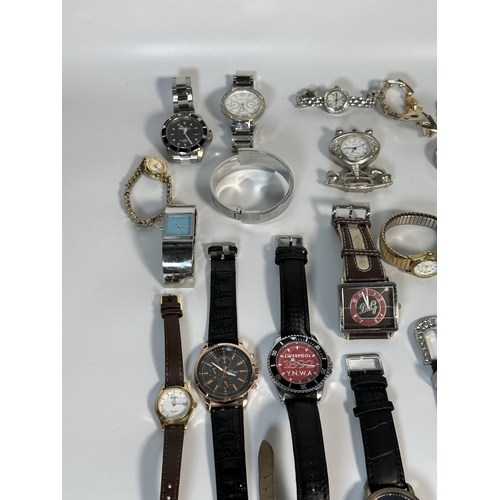 2181 - A large collection of quartz wristwatches to include Michael Kors, Geneva etc.