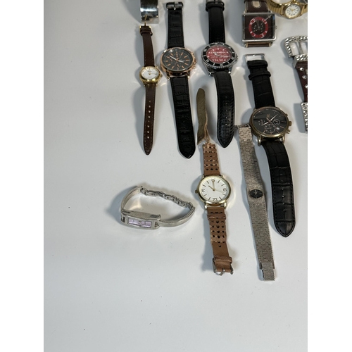 2181 - A large collection of quartz wristwatches to include Michael Kors, Geneva etc.