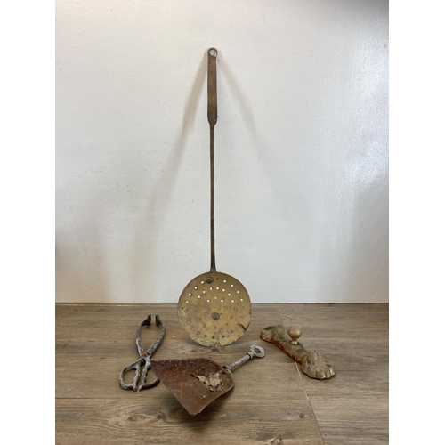 447 - A collection of antique metalware to include copper and brass riveted coal bucket, brass three piece... 