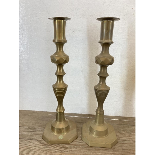 450 - A collection of vintage metalware to include a pair of 19th century style brass candlesticks - appro... 