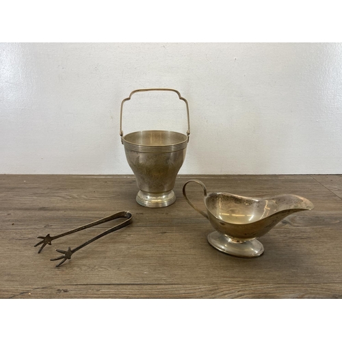 450 - A collection of vintage metalware to include a pair of 19th century style brass candlesticks - appro... 