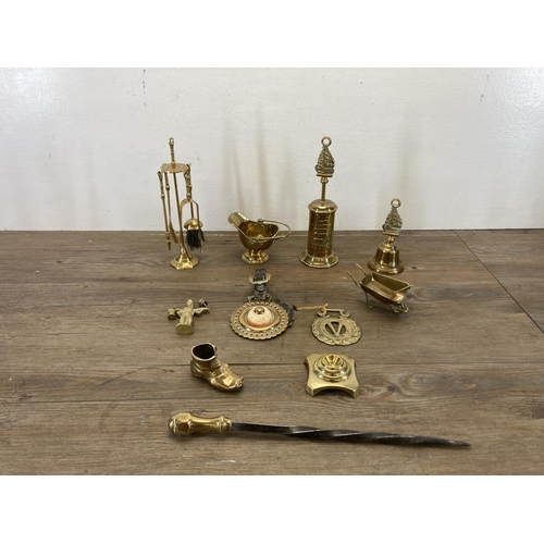 459 - A collection of copper and brassware to include novelty miniature companion set, brass jugs, miniatu... 