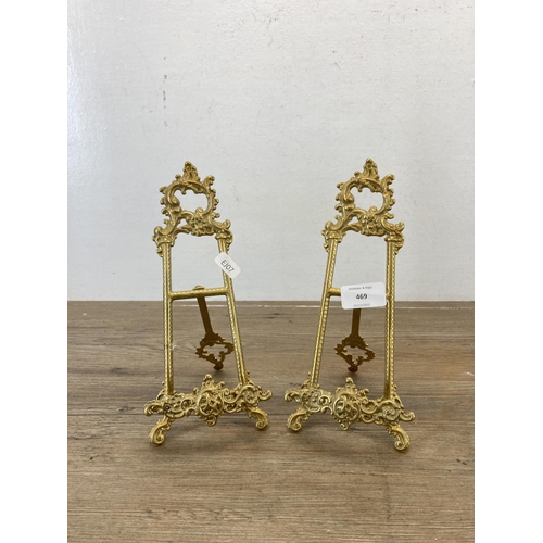 469 - A pair of Rococo style brass easels