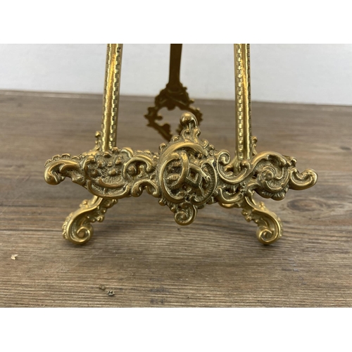 469 - A pair of Rococo style brass easels