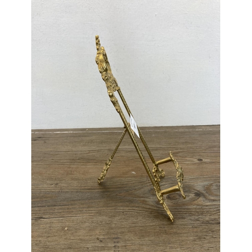 469 - A pair of Rococo style brass easels