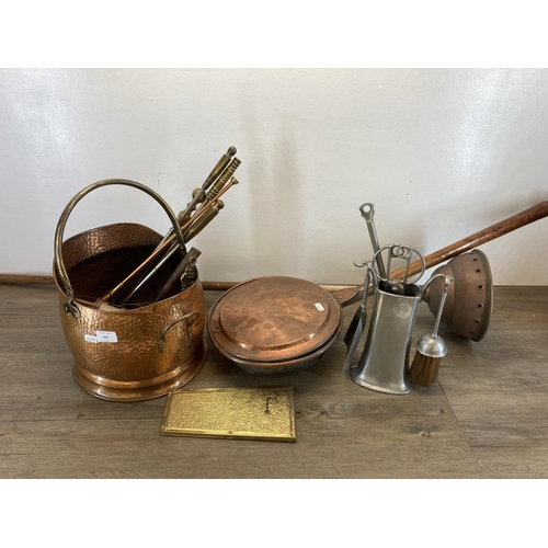 470 - A collection of 19th century and later metalware to include hammered copper and brass coal bucket, c... 