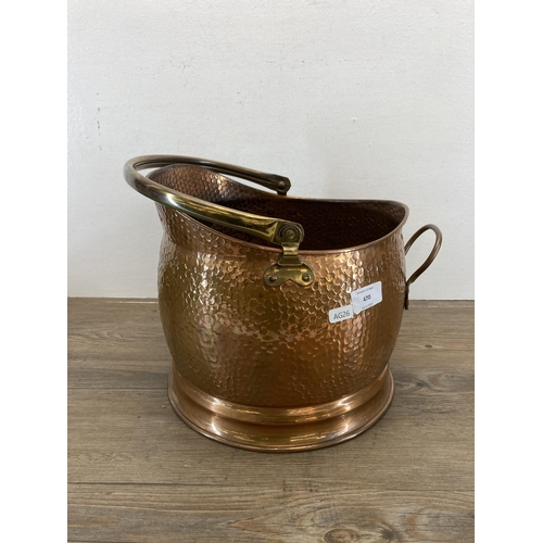 470 - A collection of 19th century and later metalware to include hammered copper and brass coal bucket, c... 