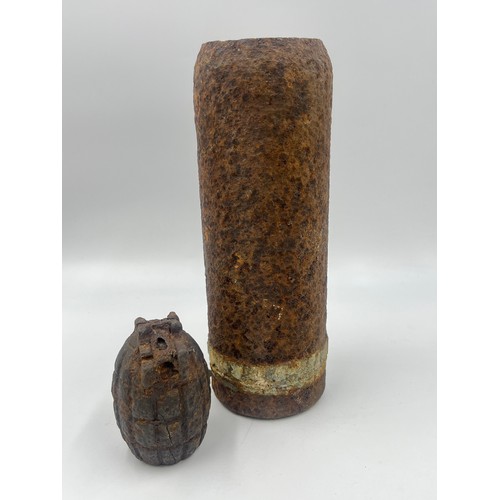 2310 - A WWI British relic Mills bomb and shell found on the Somme