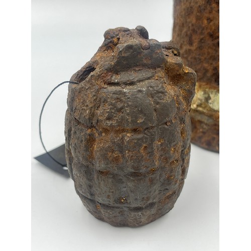 2310 - A WWI British relic Mills bomb and shell found on the Somme