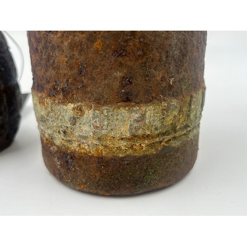 2310 - A WWI British relic Mills bomb and shell found on the Somme