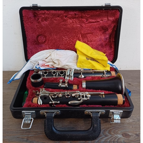 825 - A cased Yamaha YCL-34II B♭ clarinet with pull through and key oil