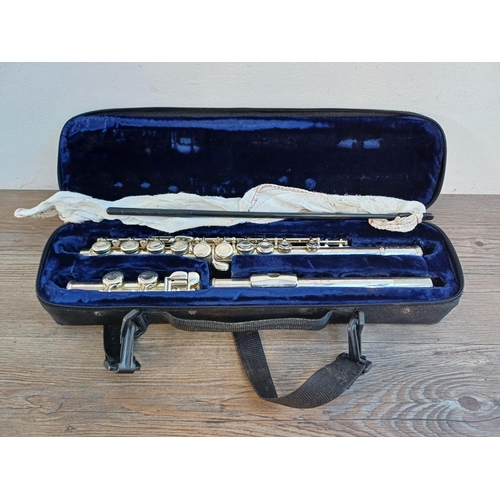 829 - A cased Trevor J. James TJ10x III flute