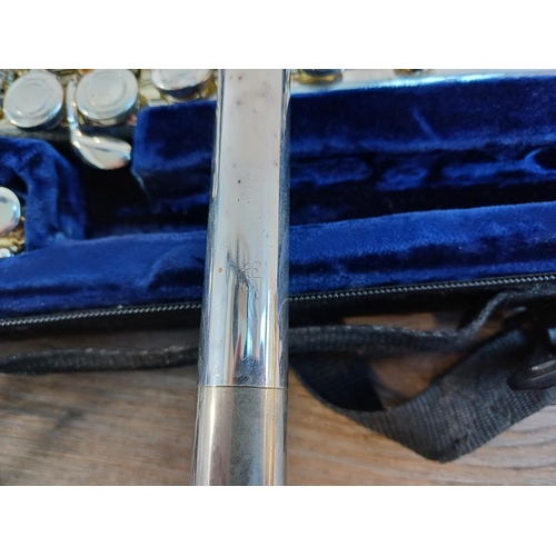 829 - A cased Trevor J. James TJ10x III flute